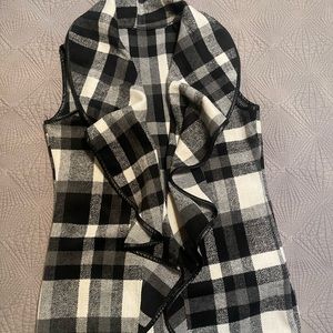 Sleeveless open front vest